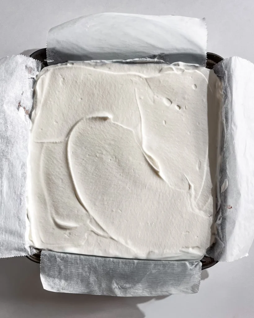 Coconut cream brownies on a plate