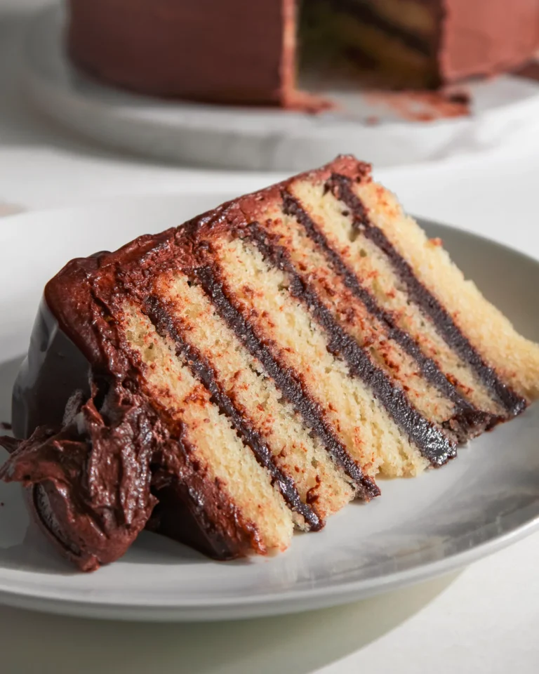 eggless and vegan vanilla chocolate fudge cake on a plate
