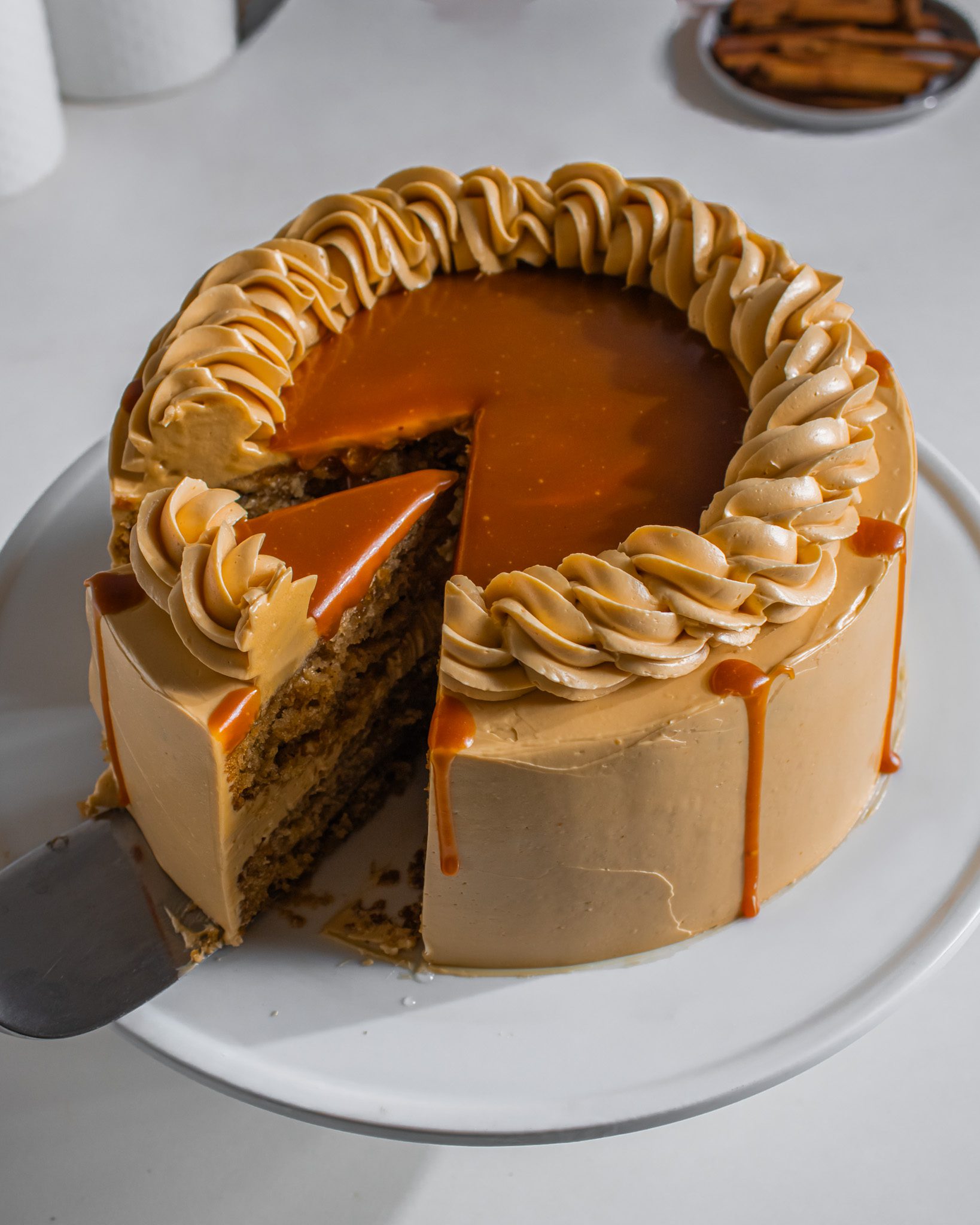 eggless apple cinnamon cake with caramel buttercream topping