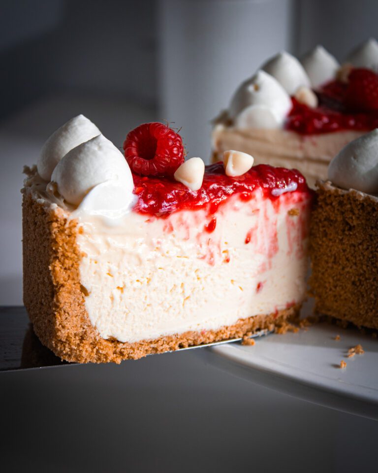 slice of Gelatin-free no bake cheesecake with raspberry swirl