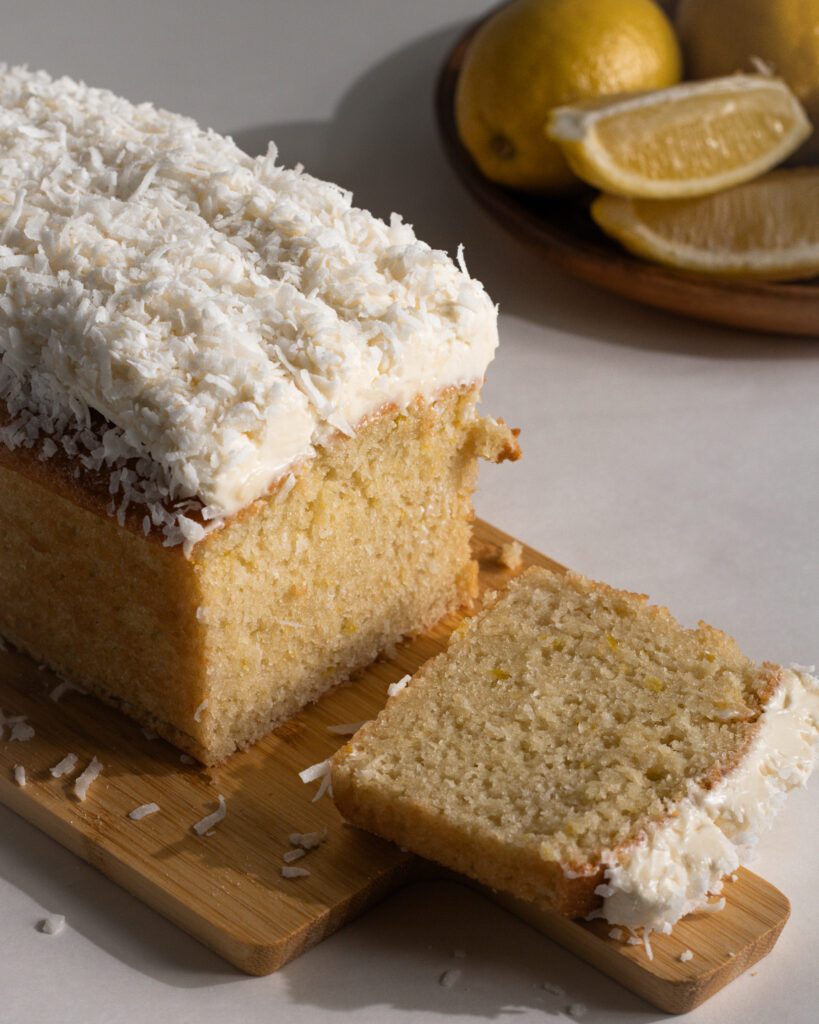 Close-up of moist lemon coconut loaf cake slice