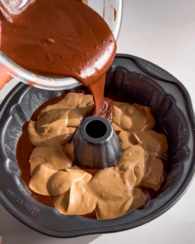 Filling chocolate cake batter with coffee cream cheese filling