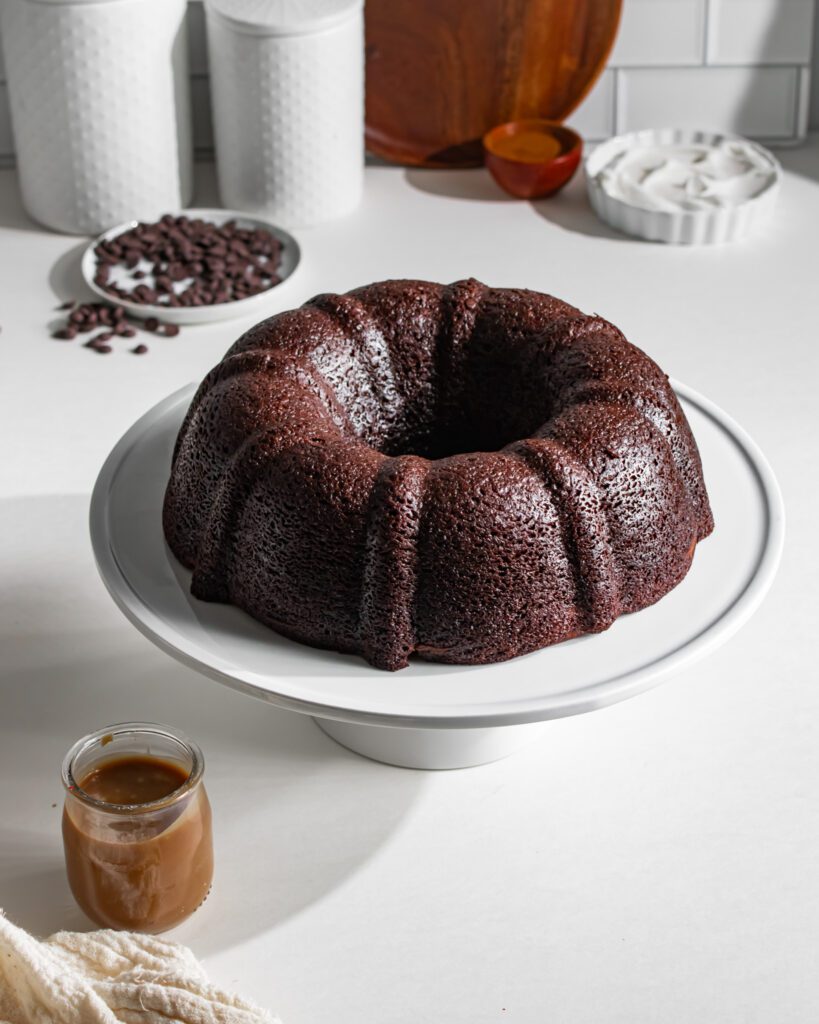 Freshly baked chocolate bundt cake with coffee icing