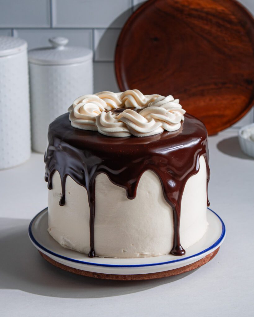Rich eggless chocolate cake with glossy chocolate glaze jpg