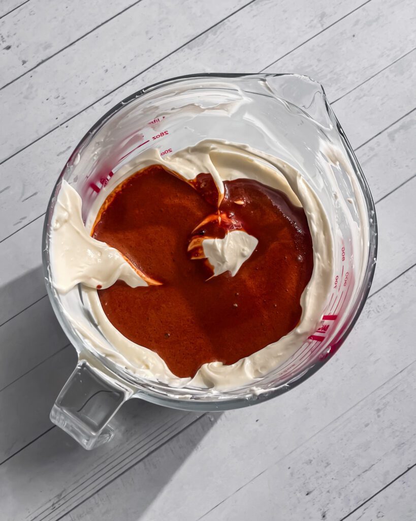 mixing coffee with cream cheese filling